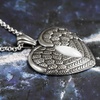 image:imageControse Antique Stainless Steel Winged Heart Necklace with Mother of Pearl Elegance