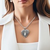image:imageControse Antique Stainless Steel Winged Heart Necklace with Mother of Pearl Elegance